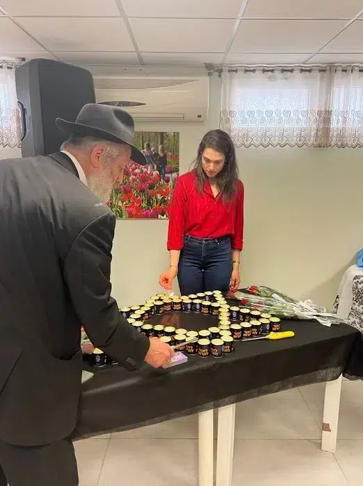 מרינה מקסימיליאן בטקס יום השואה בלחיות בכבוד